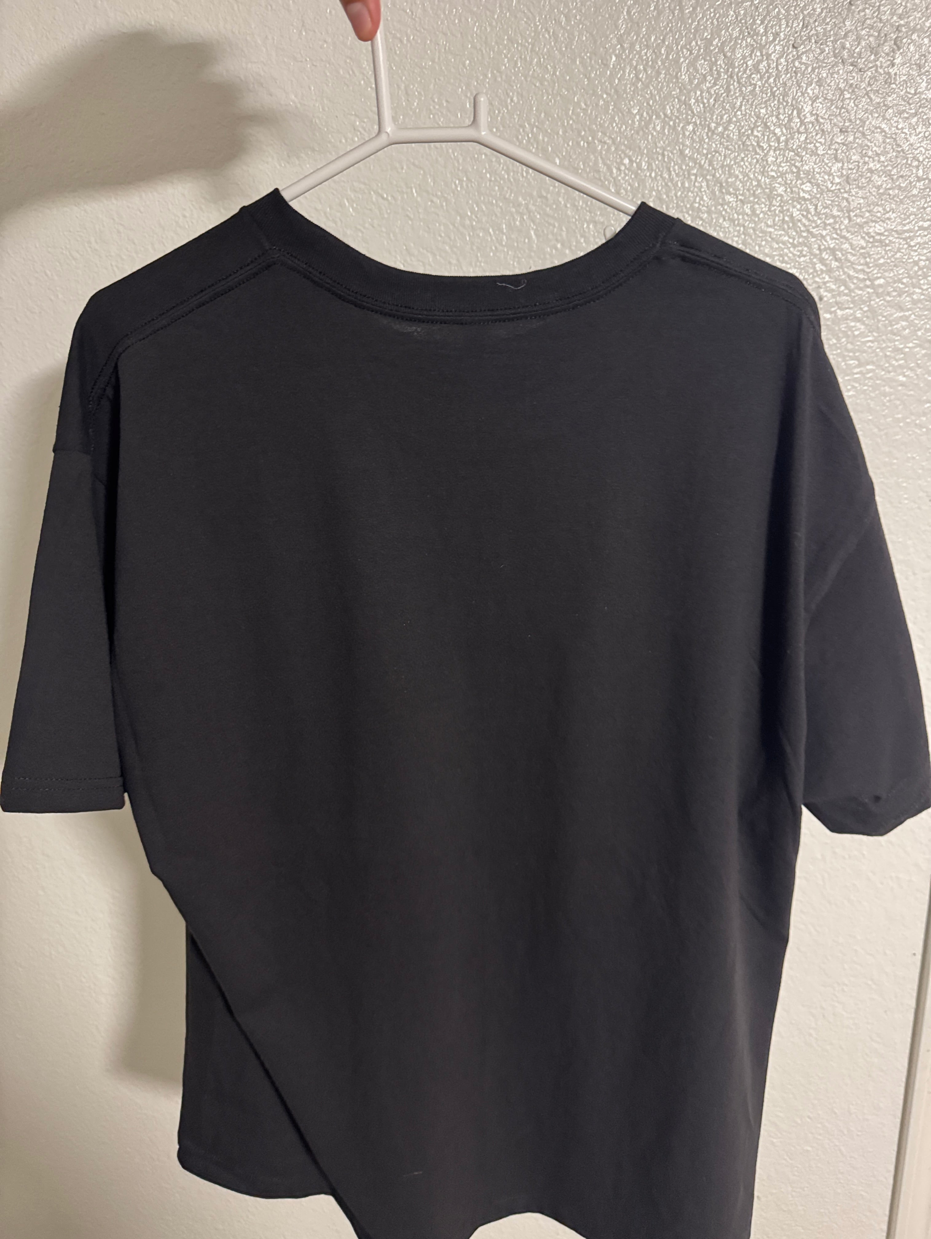 GET IT BY ANY MEANS NECESSARY Black Tee